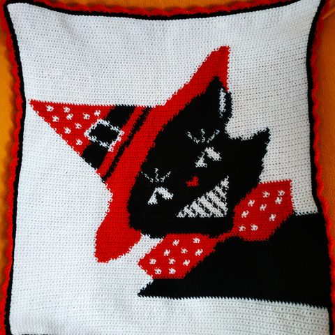Midnight Mischief: black cat in a witch's hat, tapestry crochet cushion cover