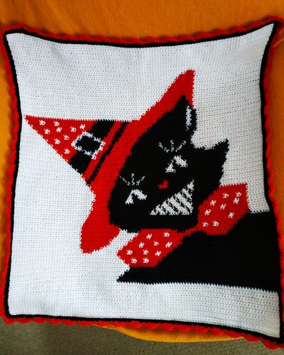 The finished Midnight Mischief cushion cover laid flat